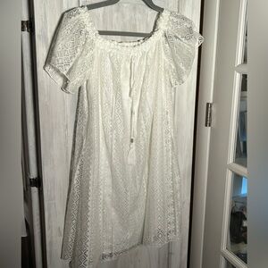 Bohemian White Lace Dress with trendy tassels.